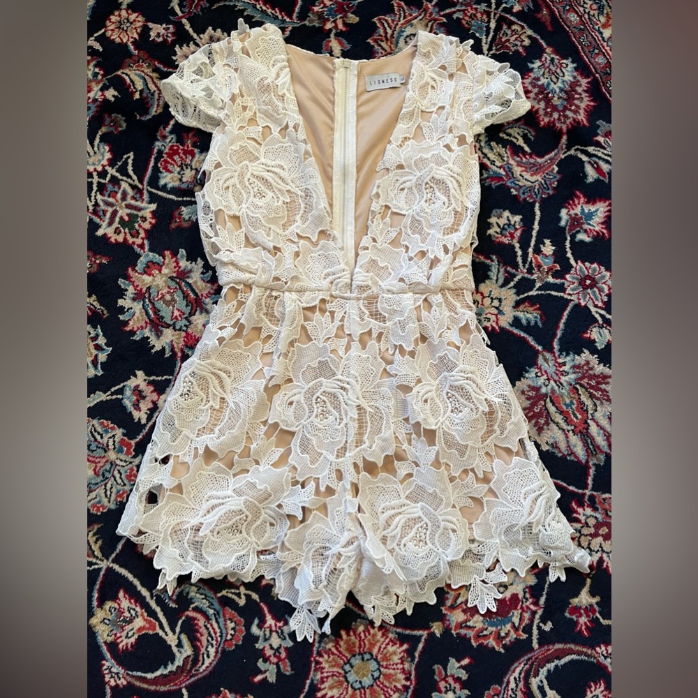 White Jump suit. Look very sexy and lovely.